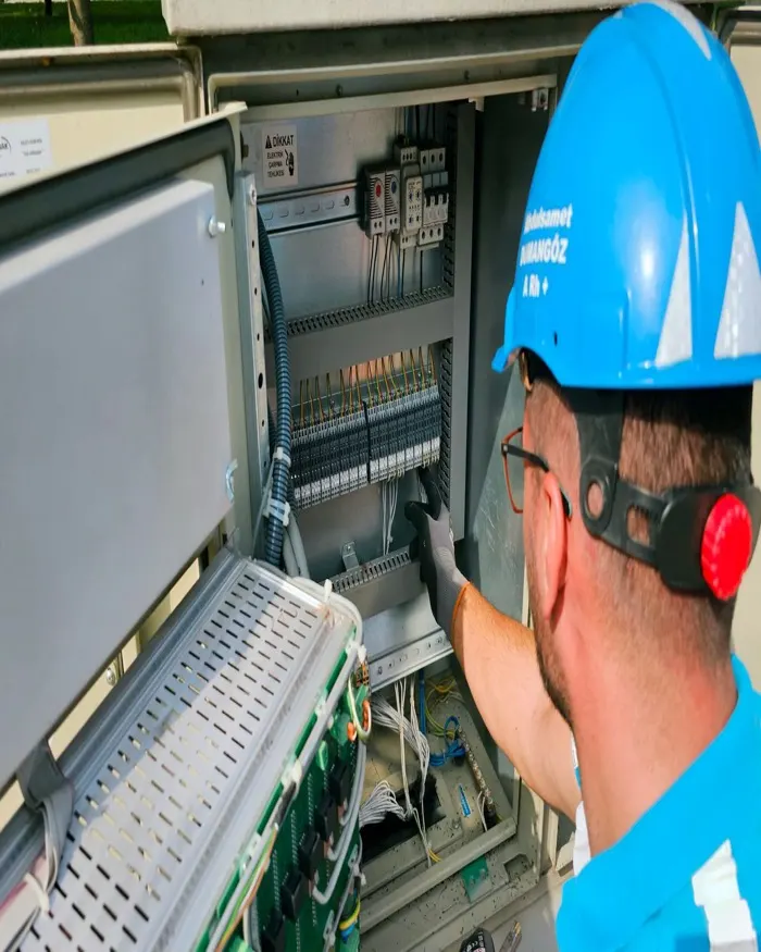 Electrician working on a panel